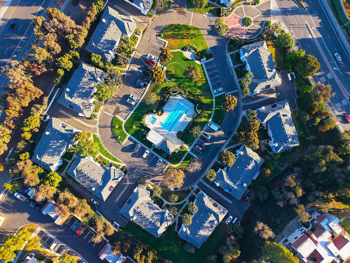aerial view photo of condos with swimming pool